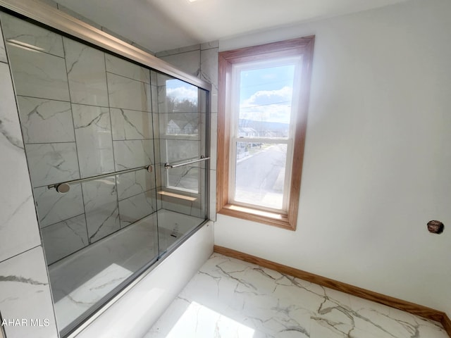 3100 Oak Ave, Altoona, PA 16601 - bathroom featuring baseboards, marble finish floor, a wealth of natural light, and enclosed tub / shower combo