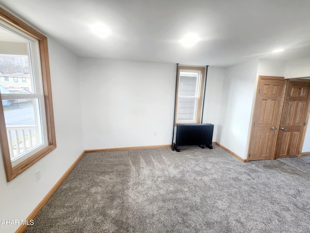 3100 Oak Ave, Altoona, PA 16601 - carpeted empty room with baseboards and radiator heating unit
