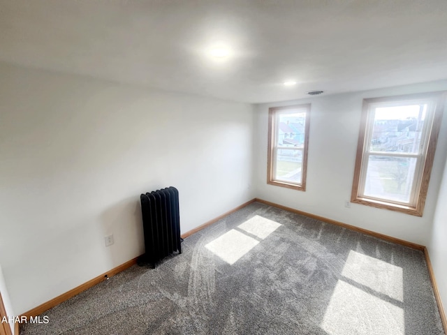 3100 Oak Ave, Altoona, PA 16601 - unfurnished room with baseboards, visible vents, radiator heating unit, and carpet