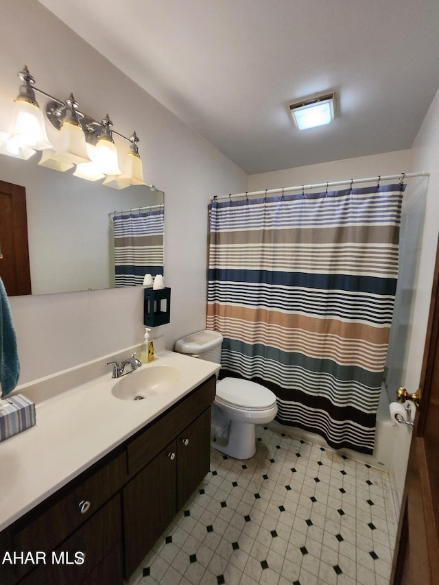 full bathroom featuring vanity, toilet, and shower / bath combo