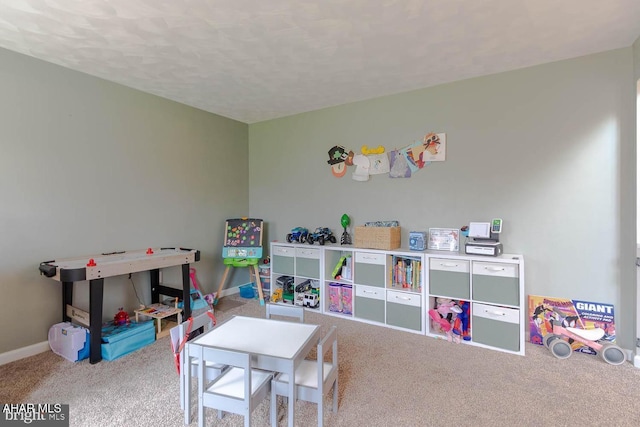 215 Oakwood Dr, Philipsburg, PA 16866 - playroom featuring carpet floors, a textured ceiling, and baseboards