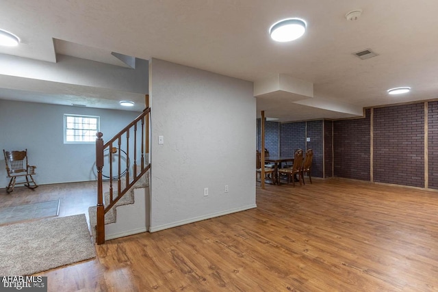 215 Oakwood Dr, Philipsburg, PA 16866 - basement with stairs, baseboards, visible vents, and wood finished floors