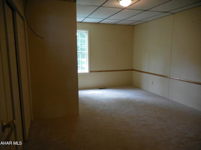 2743 Everett Rd, East Freedom, PA 16637 - carpeted empty room featuring a drop ceiling