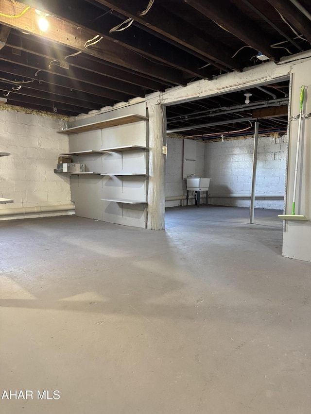 unfinished basement with a sink