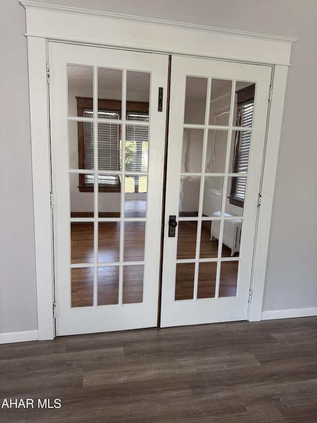 details with wood finished floors and baseboards