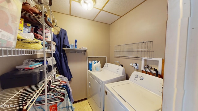 laundry area with laundry area and independent washer and dryer