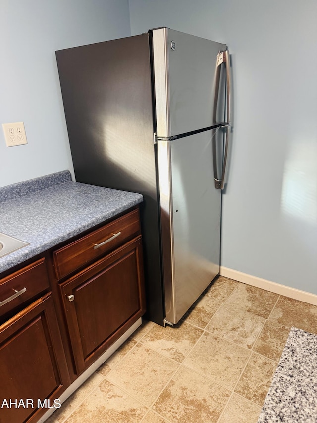 kitchen with stainless steel fridge