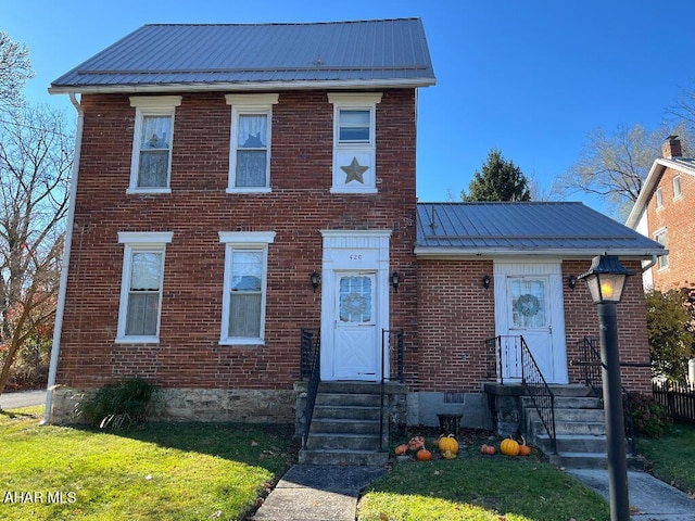 view of front of house featuring a front yard