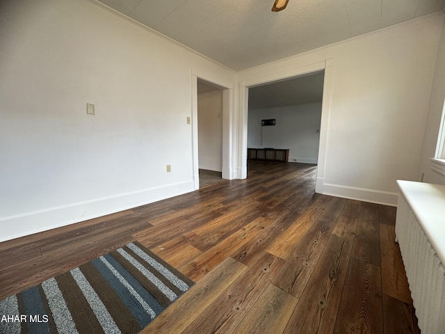 interior space with dark hardwood / wood-style floors