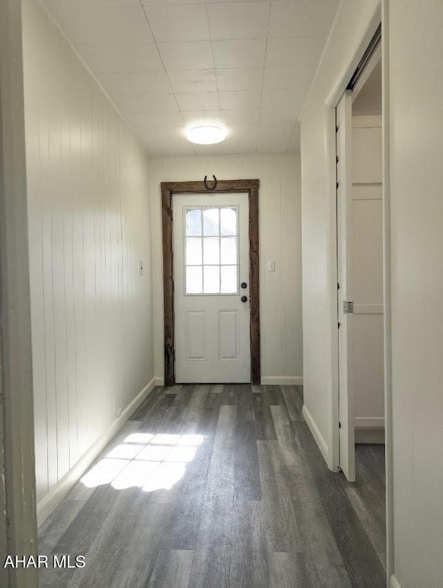 entryway with hardwood / wood-style flooring