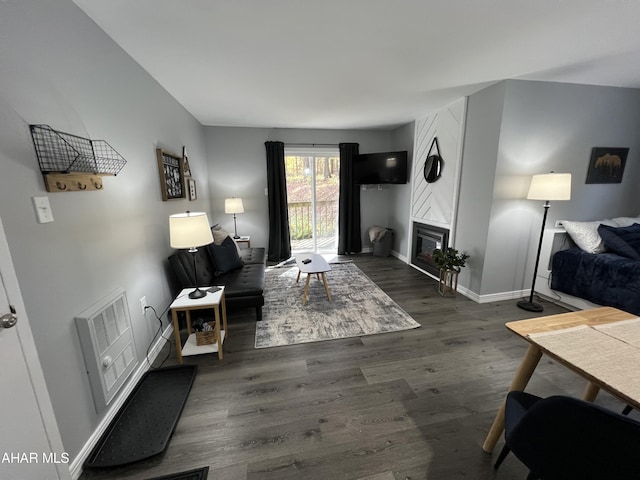 215 E Valley Point Ln, Claysburg, PA 16625 - living room with dark wood-style flooring and a large fireplace
