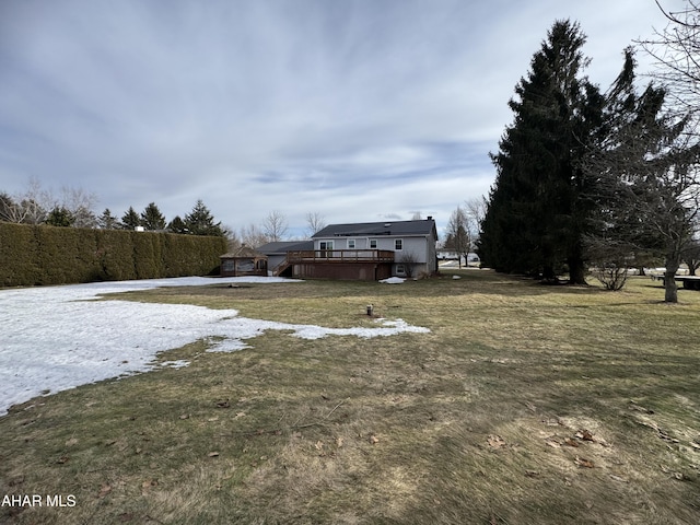 view of yard featuring a wooden deck