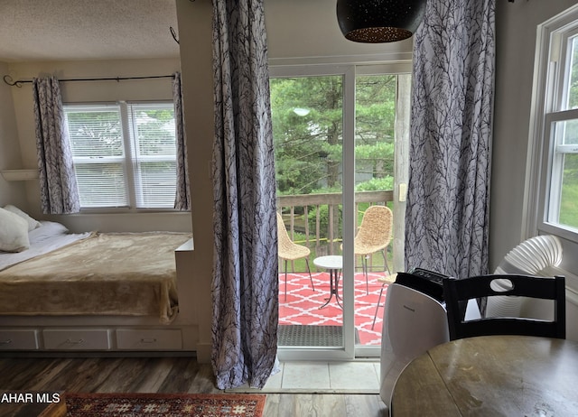 185 E Valley Point Ln, Claysburg, PA 16625 - doorway to outside with wood finished floors and a textured ceiling