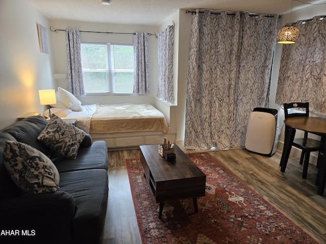 185 E Valley Point Ln, Claysburg, PA 16625 - living area with wood finished floors and a textured ceiling