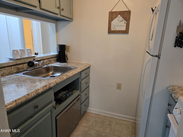 185 E Valley Point Ln, Claysburg, PA 16625 - kitchen with freestanding refrigerator, light tile patterned floors, and light countertops
