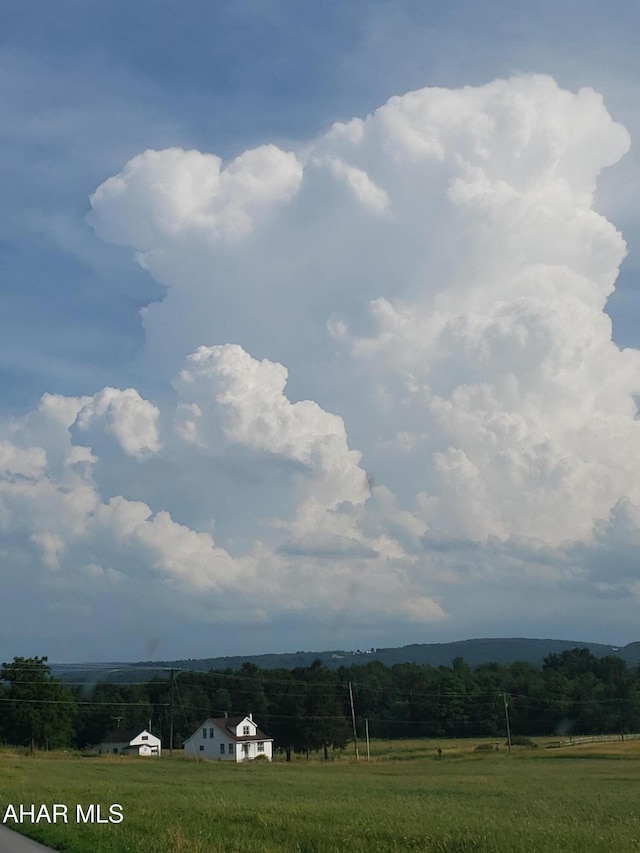 view of mountain feature featuring a rural view