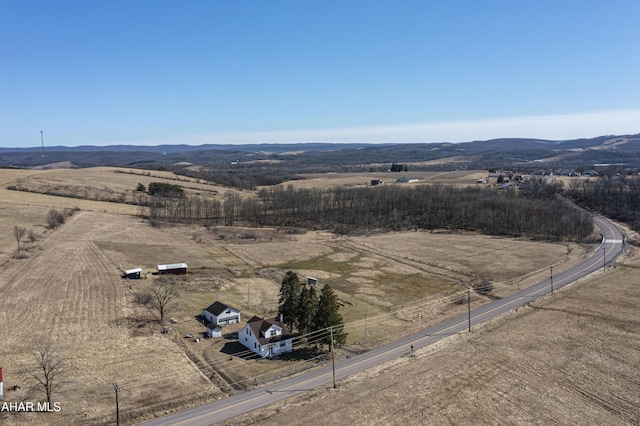 drone / aerial view with a rural view and a mountain view