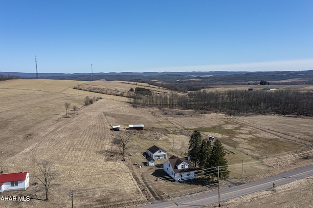 birds eye view of property featuring a rural view