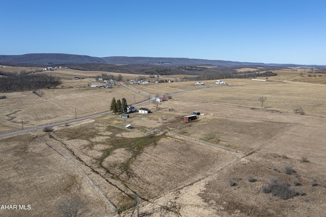 birds eye view of property featuring a rural view and a mountain view