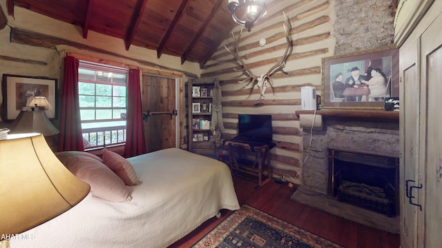 166 Mink Rd, Boswell, PA 15531 - bedroom with wooden ceiling, wood finished floors, and a stone fireplace