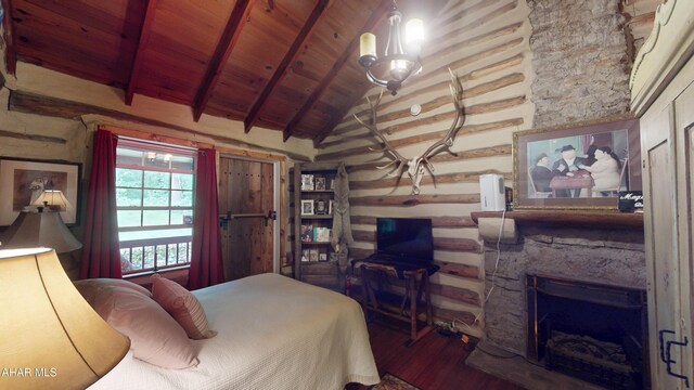 166 Mink Rd, Boswell, PA 15531 - bedroom with wood ceiling, wood finished floors, and a fireplace