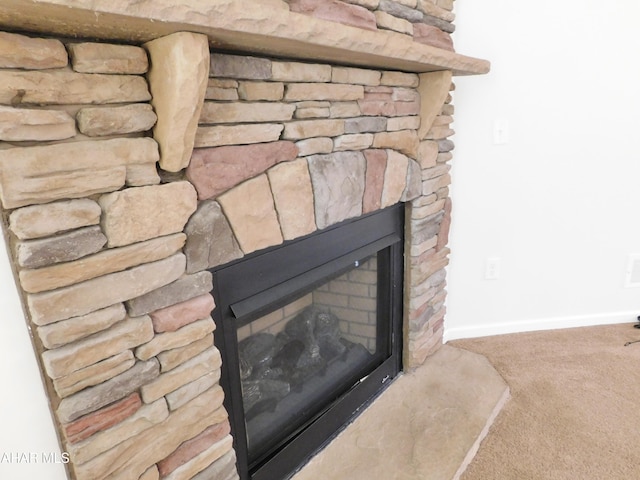 115 Spruce St, Smithmill, PA 16680 - detailed view of a fireplace, carpet floors, and baseboards