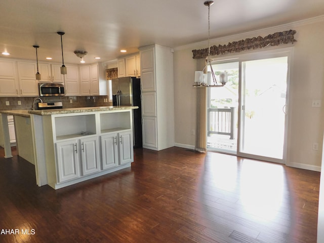 115 Spruce St, Smithmill, PA 16680 - kitchen with stainless steel appliances, crown molding, tasteful backsplash, white cabinetry, and recessed lighting