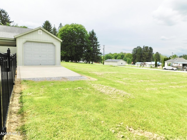 115 Spruce St, Smithmill, PA 16680 - view of yard featuring concrete driveway and an attached garage