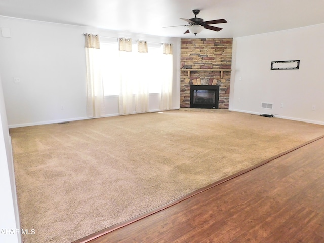 115 Spruce St, Smithmill, PA 16680 - unfurnished living room with ceiling fan, ornamental molding, baseboards, and a fireplace