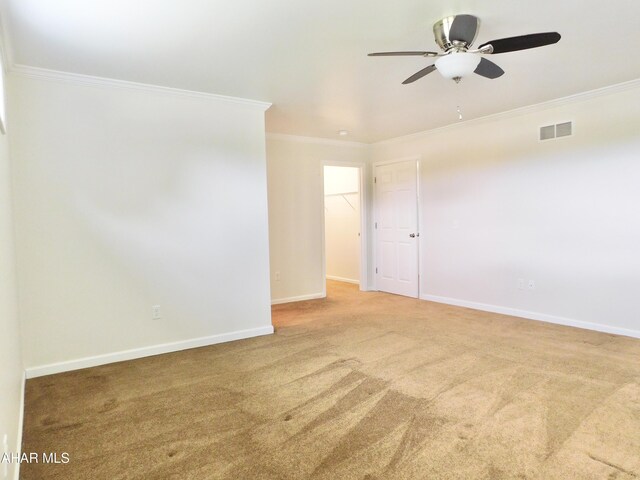 115 Spruce St, Smithmill, PA 16680 - empty room featuring crown molding, ceiling fan, carpet flooring, and baseboards
