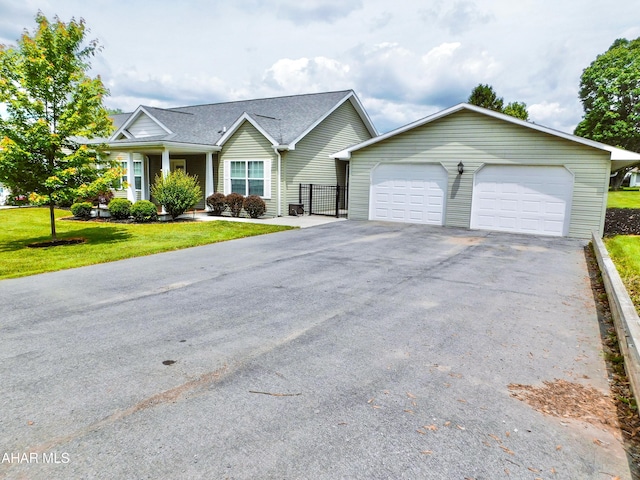 115 Spruce St, Smithmill, PA 16680 - view of front facade with driveway and an attached garage
