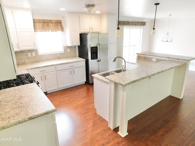 115 Spruce St, Smithmill, PA 16680 - kitchen featuring stainless steel refrigerator with ice dispenser, a sink, dark wood-type flooring, backsplash, and recessed lighting