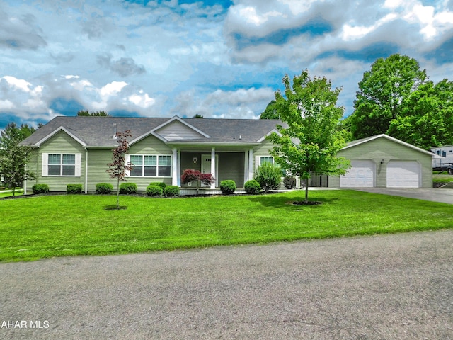 115 Spruce St, Smithmill, PA 16680 - ranch-style home with a detached garage, covered porch, a front lawn, and a shingled roof