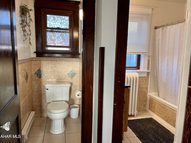 full bathroom with radiator, a healthy amount of sunlight, tile patterned flooring, a baseboard heating unit, and tile walls