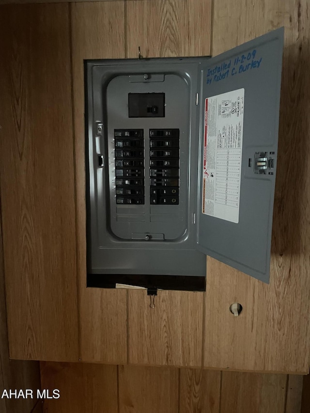 utility room featuring electric panel