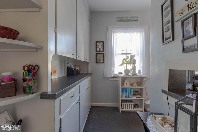 kitchen with white cabinets