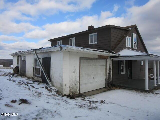 exterior space featuring a garage