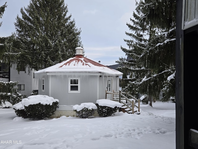 view of snow covered property