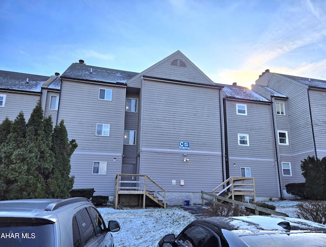 view of snow covered house