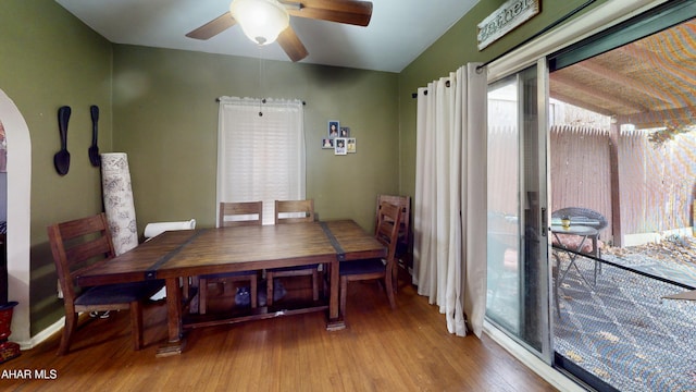 dining area featuring light wood-type flooring and ceiling fan