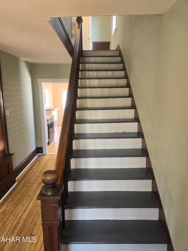 313 E John St, Bedford, PA 15522 - stairs with wood finished floors