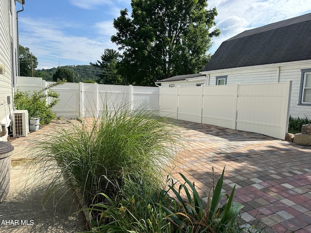 313 E John St, Bedford, PA 15522 - fenced backyard featuring a patio