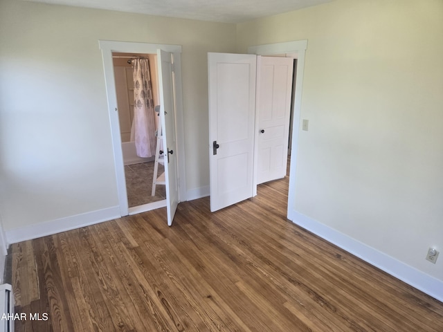 313 E John St, Bedford, PA 15522 - unfurnished bedroom with baseboards and wood finished floors