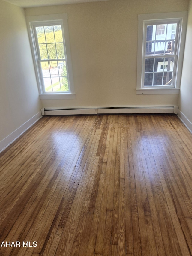 313 E John St, Bedford, PA 15522 - spare room with hardwood / wood-style floors and a baseboard radiator