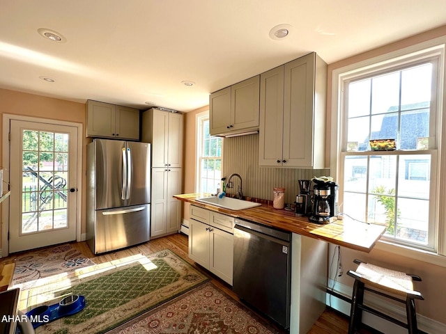 313 E John St, Bedford, PA 15522 - kitchen with stainless steel appliances, light wood-style floors, wood counters, gray cabinetry, and recessed lighting