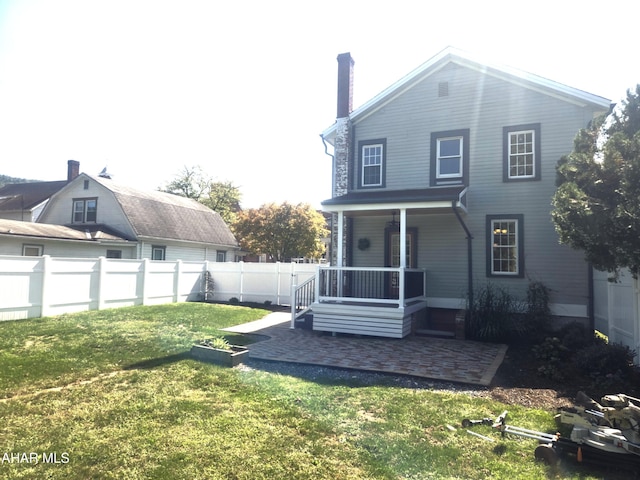 313 E John St, Bedford, PA 15522 - rear view of property with a fenced backyard and a porch