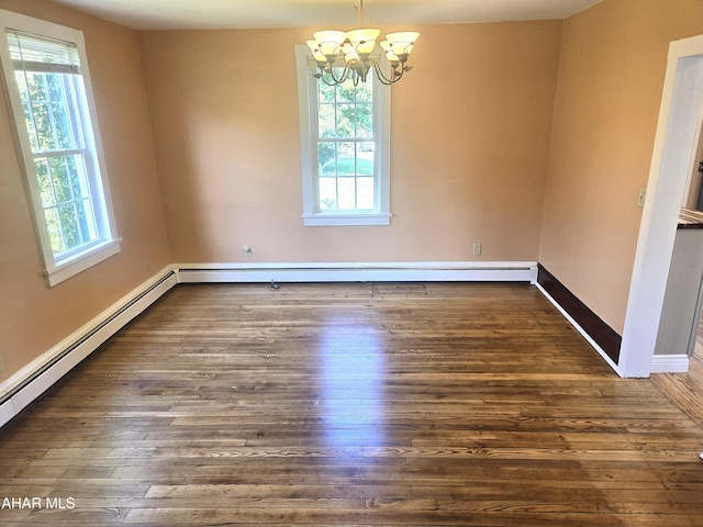 313 E John St, Bedford, PA 15522 - unfurnished room with plenty of natural light, a chandelier, wood finished floors, and a baseboard heating unit