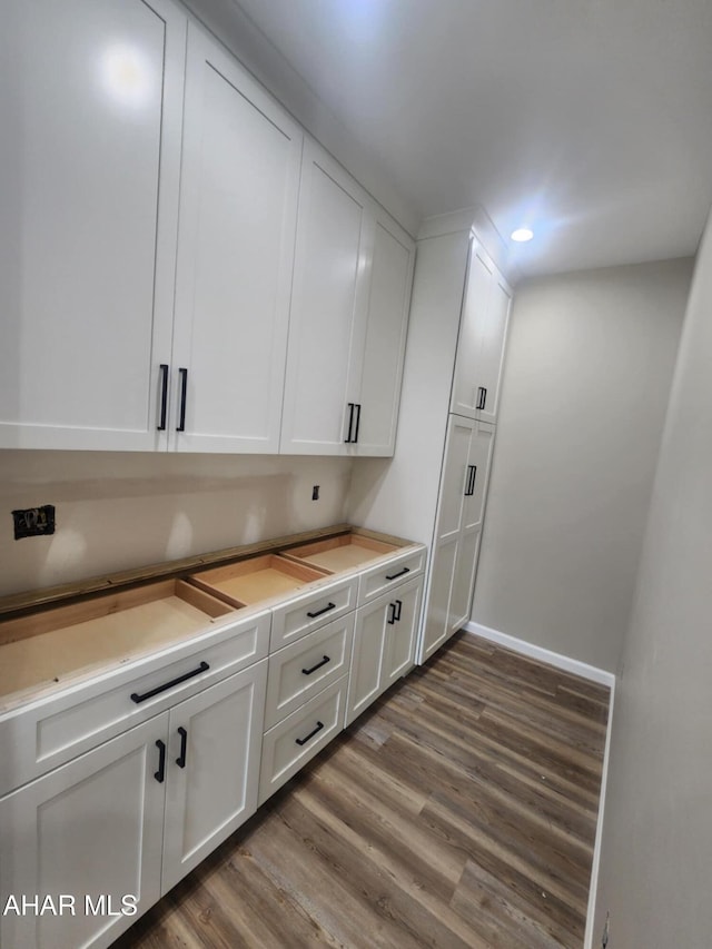 171 Deer Track Rd, Duncansville, PA 16635 - kitchen with white cabinetry, wood finished floors, recessed lighting, and light countertops
