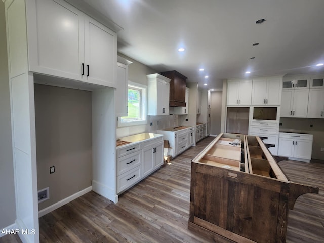 171 Deer Track Rd, Duncansville, PA 16635 - kitchen with wood finished floors, recessed lighting, a center island, white cabinets, and glass insert cabinets