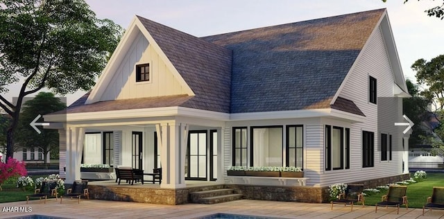 rear view of house with a porch